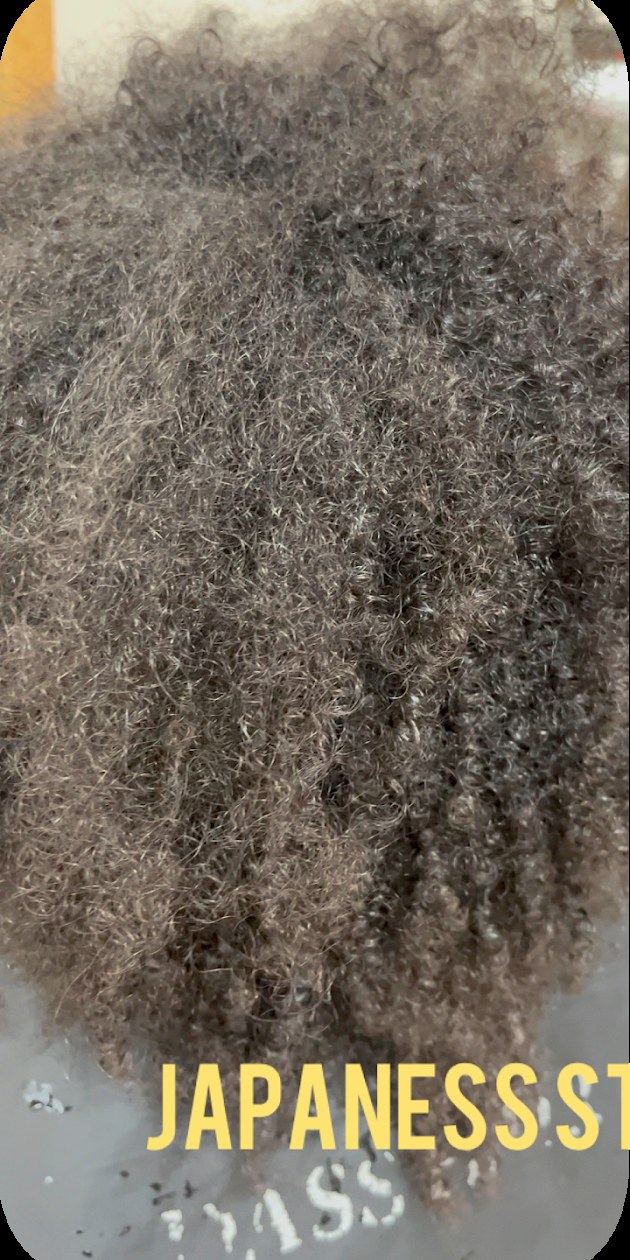Before: very tight, resistant curls before Japanese permanent straightening at Dass Hair Salon, Carrollton TX